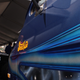 Illustration for article titled The Coolest Car At The Monterey Motorsports Reunion Is This Custom Van With an F1 Car